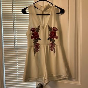 White romper with floral embroidery size S